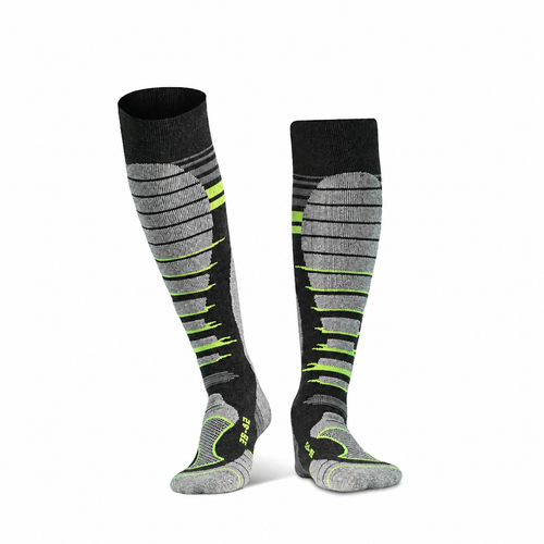 Alpine Merino Ski Socks in black and green on a clean white background
